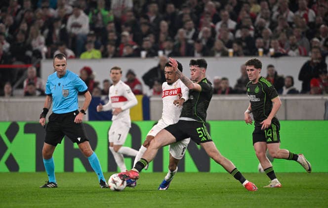 Coby Donovan Celtic 51 vs Tiago Tomas VfB Stuttgart 08 VfB Stuttgart vs Celtic Glasgow FC EUROPA LEAGUE EL 26 02 2026 DFL REGULATIONS PROHIBIT ANY USE OF PHOTOGRAPHS AS IMAGE SEQUENCES AND OR QUASI VIDEO VfB Stuttgart vs Celtic Glasgow FC EL