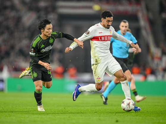 Reo Hatate Celtic FC and Tiago Tomas VfB Stuttgart battle for the ball during the UEFA Europa League 2025 26 Knockout Play off Second Leg match between VfB Stuttgart and Celtic FC at Stuttgart Arena on February 26, 2026 in Stuttgart, Germany Photo by Harry Langer DeFodi Images