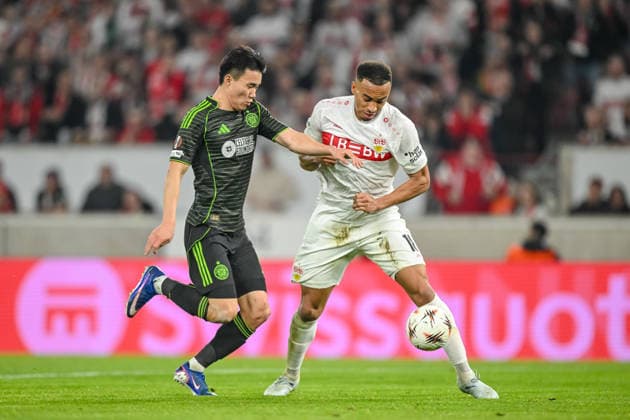 Reo Hatate Celtic FC and Jamie Leweling VfB Stuttgart battle for the ball during the UEFA Europa League 2025 26 Knockout Play off Second Leg match between VfB Stuttgart and Celtic FC at Stuttgart Arena on February 26, 2026 in Stuttgart, Germany Photo by Harry Langer DeFodi Images