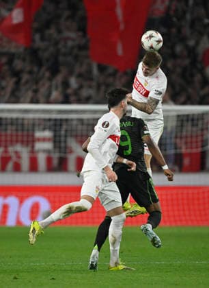 Header duel duel action Junior Adamu Celtic Glasgow FC 09 vs Finn Jeltsch VfB Stuttgart 29 VfB Stuttgart vs Celtic Glasgow FC EUROPA LEAGUE EL 26 02 2026 DFL REGULATIONS PROHIBIT ANY USE OF PHOTOGRAPHS AS IMAGE SEQUENCES AND OR QUASI VIDEO VfB Stuttgart vs Celtic Glasgow FC EL