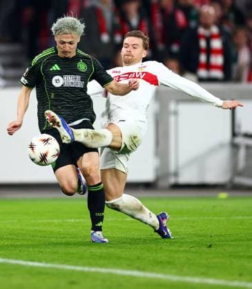 Daizen Maeda of Celtic and Maximilian Mittelstadt of Stuttgart. Stuttgart v Celtic, UEFA Europa League, Knockout Round Play Offs, Second Leg, Football, MHP Arena, Stuttgart, Germany - 26 Feb 2026Stuttgart MHP Arena Germany EDITORIAL USE ONLY No use with unauthorised audio, video, data, fixture lists, club league logos or live services. Online in-match use limited to 120 images, no video emulation. No use in betting, games or single club league player publications. Copyright: xJamesxMarsh Shutterstockx 16701577ch