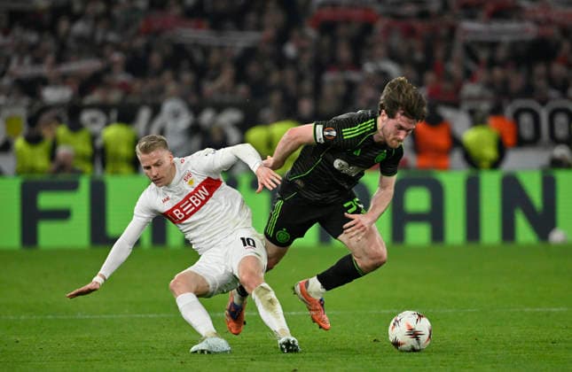 duel, action Chris Fuehrich VfB Stuttgart 10 vs Anthony Ralston Celtic Glasgow FC 56 in the background perimeter advertising logo FLIXTRAIN VfB Stuttgart vs Celtic Glasgow FC EUROPA LEAGUE EL 26 02 2026 DFL REGULATIONS PROHIBIT ANY USE OF PHOTOGRAPHS AS IMAGE SEQUENCES AND OR QUASI VIDEO VfB Stuttgart vs Celtic Glasgow FC EL