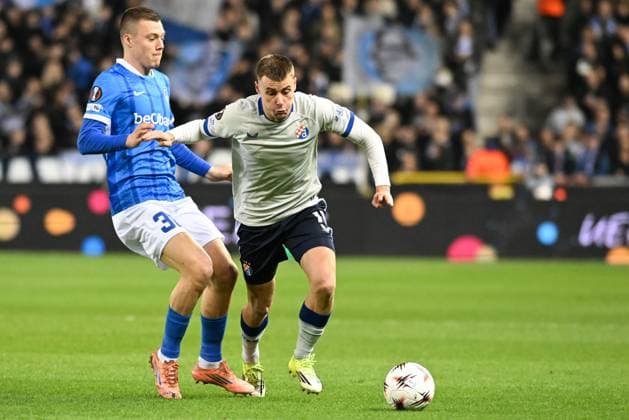 Genk s Daan Heymans and Dinamo s Gabriel Vidovic pictured in action during a soccer game between Belgian team KRC Genk and Croatian GNK Dinamo Zagreb, Thursday 26 February 2026 in Genk, in the play-off for the knockout phase of the UEFA Europa League tournament. Genk won the first leg 1-3. JILLxDELSAUX  x165467918x