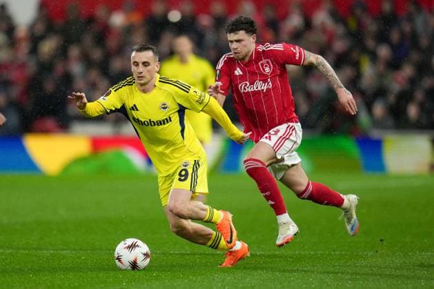 Kerem Aktürkoglu of Fenerbache and Neco Williams of Nottingham Forest Nottingham Forest v Fenerbache, UEFA Europa League, Knockout Round Play Offs, Second Leg, Football, City Ground, Nottingham, UK - 26 Feb 2026Nottingham City Ground Turkey EDITORIAL USE ONLY No use with unauthorised audio, video, data, fixture lists, club league logos or live services. Online in-match use limited to 120 images, no video emulation. No use in betting, games or single club league player publications. Copyright: xJoexToth Shutterstockx 16701591v