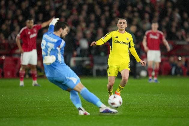 Kerem Aktürkoglu of Fenerbache puts pressure on Nottingham Forest Goalkeeper Stefan Ortega Nottingham Forest v Fenerbache, UEFA Europa League, Knockout Round Play Offs, Second Leg, Football, City Ground, Nottingham, UK - 26 Feb 2026Nottingham City Ground Turkey EDITORIAL USE ONLY No use with unauthorised audio, video, data, fixture lists, club league logos or live services. Online in-match use limited to 120 images, no video emulation. No use in betting, games or single club league player publications. Copyright: xJoexToth Shutterstockx 16701591y