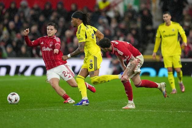 Archie Brown of Fenerbache and James McAtee of Nottingham Forest Nottingham Forest v Fenerbache, UEFA Europa League, Knockout Round Play Offs, Second Leg, Football, City Ground, Nottingham, UK - 26 Feb 2026Nottingham City Ground Turkey EDITORIAL USE ONLY No use with unauthorised audio, video, data, fixture lists, club league logos or live services. Online in-match use limited to 120 images, no video emulation. No use in betting, games or single club league player publications. Copyright: xJoexToth Shutterstockx 16701591z