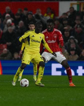 Nottingham Forest v Fenerbahce - UEFA Europa League NOTTINGHAM, UNITED KINGDOM - FEBRUARY 26: Kante (L) of Fenerbahce in action against Ibrahim Sangare (R) of Nottingham Forest during UEFA Europa League round of 16 play-off match between Nottingham Forest and Fenerbahce at City Ground Stadium in Nottingham, United Kingdom on February 26, 2026. Rasid Necati Aslim Anadolu Nottingham United Kingdom. Editorial use only. Please get in touch for any other usage.  Copyright: x2026xAnadoluxRasidxNecatixAslimx