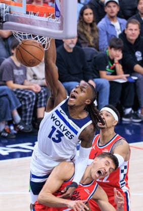 February 26, 2026, Inglewood, California, USA: Ayo Dosunmu 13 of the Minnesota Timberwolves gets past Bogdan Bogdanovic 7 of the Los Angeles Clippers to dunk the ball during a regular season NBA, Basketball Herren, USA game on Thursday February 26, 2026 at Intuit Dome Arena in Inglewood, California. Clippers lose to Timberwolves, 88-94. JAVIER ROJAS PI Inglewood USA - ZUMAp124 20260226_zaa_p124_056 Copyright: xJavierxRojasx