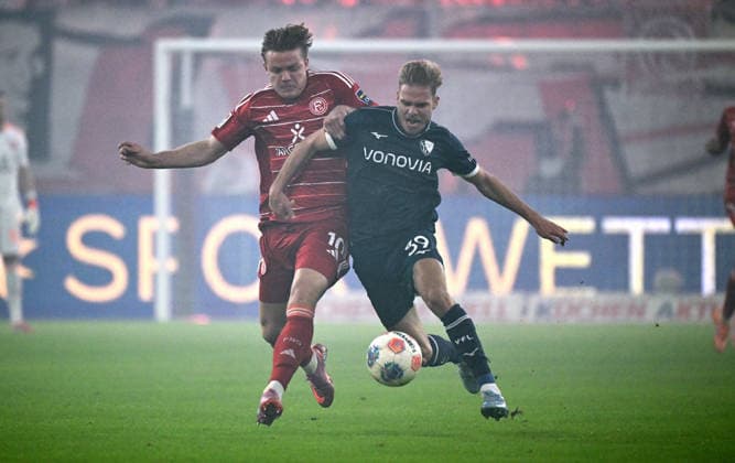 Football, 2 Bundesliga, Germany, Men, Season 2025 2026, 24 Matchday, Merkur Spiel Arena Düsseldorf, Fortuna Düsseldorf VfL Bochum Christian Rasmussen F95 , Leandro Morgalla BOC Action