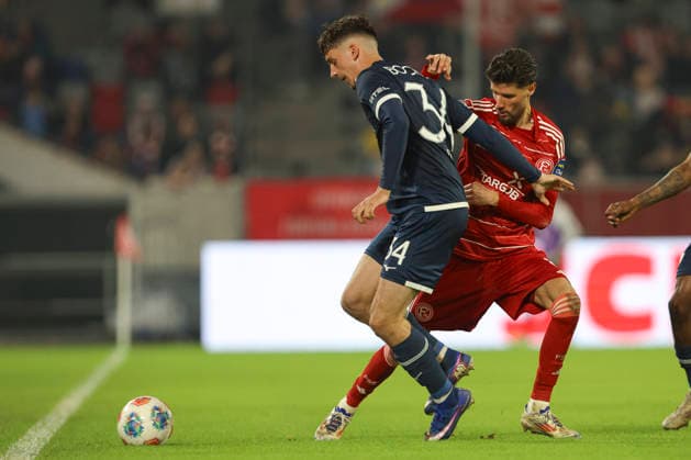 Cajetan Lenz VfL Bochum and Anouar El Azzouzi Fortuna Düsseldorf in a duel during the 2 Bundesliga match between Fortuna Düsseldorf and VfL Bochum, Merkur Spiel Arena on February 27, 2026 in Düsseldorf, Germany Photo by Oliver Kaelke DeFodi Images Cajetan Lenz VfL Bochum and Anouar El Azzouzi Fortuna Düsseldorf battle for the ball during the 2 Bundesliga match between Fortuna Düsseldorf and VfL Bochum at Merkur Spiel Arena on February 27, 2026 in Düsseldorf, Germany Photo by Oliver Kaelke DeFodi Images Photo by Oliver Kaelke DeFodi Images