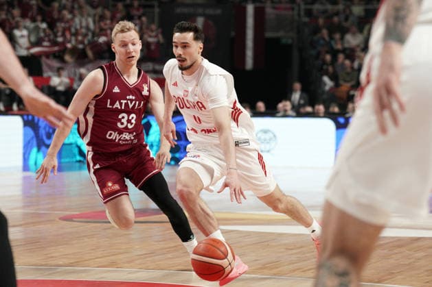 Latvia Poland Basketball, Riga, Latvia, 27.02.2026, FIBA, basketball, Latvia, Poland Andrzej Pluta of Poland and Toms Skuja of Latvia in action during FIBA Basketball World Cup European qualifiers group F game between Latvia and Poland in Riga, Latvia, 27.02.2026. Photo: Roman Koksarov (RKF) Riga Latvia Copyright: xRomanxKoksarovx RKO06659.JPG