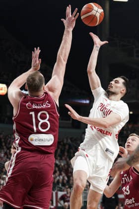 Latvia Poland Basketball, Riga, Latvia, 27.02.2026, FIBA, basketball, Latvia, Poland Andrzej Pluta of Poland and Klavs Cavars of Latvia in action during FIBA Basketball World Cup European qualifiers group F game between Latvia and Poland in Riga, Latvia, 27.02.2026. Photo: Roman Koksarov (RKF) Riga Latvia Copyright: xRomanxKoksarovx RKO06664.JPG
