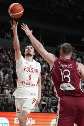 Latvia Poland Basketball, Riga, Latvia, 27.02.2026, FIBA, basketball, Latvia, Poland Andrzej Pluta of Poland and Klavs Cavars of Latvia in action during FIBA Basketball World Cup European qualifiers group F game between Latvia and Poland in Riga, Latvia, 27.02.2026. Photo: Roman Koksarov (RKF) Riga Latvia Copyright: xRomanxKoksarovx RKO06676.JPG