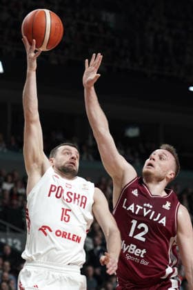 Latvia Poland Basketball, Riga, Latvia, 27.02.2026, FIBA, basketball, Latvia, Poland Kamil Laczynski of Poland and Arturs Strautins of Latvia in action during FIBA Basketball World Cup European qualifiers group F game between Latvia and Poland in Riga, Latvia, 27.02.2026. Photo: Roman Koksarov (RKF) Riga Latvia Copyright: xRomanxKoksarovx RKO06711.JPG