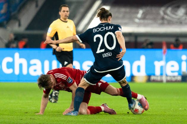 Germany 2 Bundesliga 2025 2026 Fortuna Düsseldorf vs VfL Bochum 24 Matchday 27 02 2026 Merkur Spiel Arena Nordrhein Westfalen Christian Rasmussen Fortuna Düsseldorf, 10 Noah Loosli VfL Bochum, 20 Duel duel Copyright: xCelinaxLeiersx