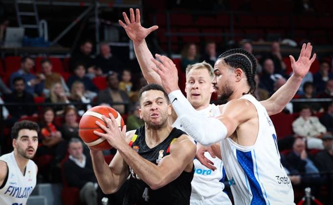 Belgium s Emmanuel Manu Lecomte and Finland s Olivier Nkamhoua fight for the ball during a basketball match between Belgian national team, Nationalteam Belgian Lions and Finland, Friday 27 February 2026 in Charleroi, qualifier 3 6 for the men s 2027 FIBA World Championships. VIRGINIExLEFOUR  x165749575x