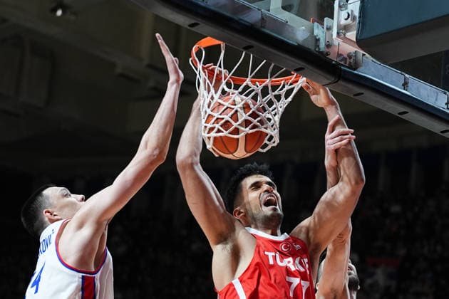 Serbia v Turkiye - 2027 World Cup European Qualifiers BELGRADE, SERBIA - FEBRUARY 27: Omer Yurtseven (77) of Turkiye in action against Nikola Tanaskovic (L) of Serbia during the 2027 World Cup European Qualifiers Group C third match between Serbia and Turkiye at the Aleksandar Nikolic Sports Hall in Belgrade, Serbia, on February 27, 2026. Adem Kutucu Anadolu Belgrade Serbia. Editorial use only. Please get in touch for any other usage.  Copyright: x2026xAnadoluxAdemxKutucux