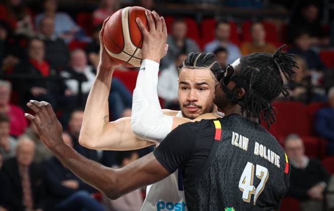 Finland s Olivier Nkamhoua and Belgium s Archange Izaw Bolavie fight for the ball during a basketball match between Belgian national team, Nationalteam Belgian Lions and Finland, Friday 27 February 2026 in Charleroi, qualifier 3 6 for the men s 2027 FIBA World Championships. VIRGINIExLEFOUR  x165773798x