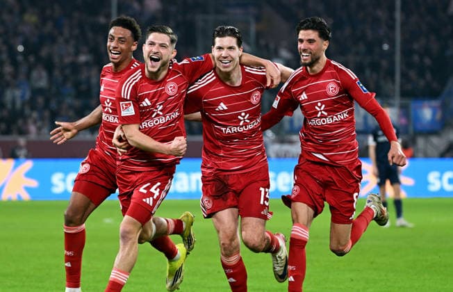 Soccer, 2 Bundesliga, Germany, Men, Season 2025 2026, Matchday 24, Merkur Spiel Arena Düsseldorf, Fortuna Düsseldorf VfL Bochum 2 1 Cheering Florent Muslija F95 after his goal for 2 0, together with Sima Suso F95 , Cedric Itten F95 , Anouar El Azzouzi F95 Cheering, joy, action