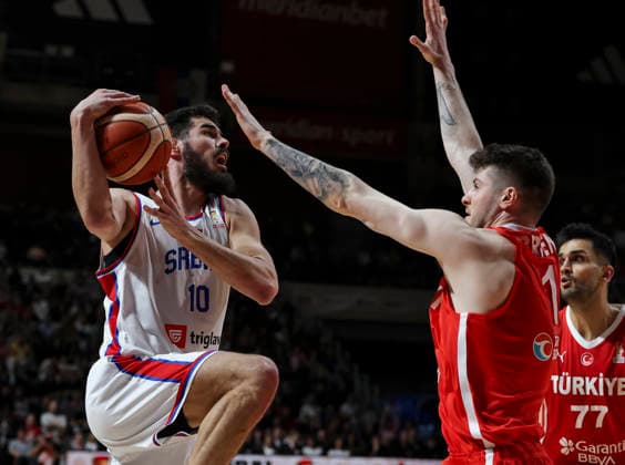 Serbia v Turkiye - FIBA Worl Cup European qualifiers, first round group C Nikola Kalinic (L) of Serbia in action against Metecan Birsen (R) of Turkiye during the FIBA World Cup European qualifiers first round group C basketball match between Serbia and Turkiye on February 27, 2026 in Belgrade, Serbia. Belgrade Serbia Copyright: xPedjaxMilosavljevic Starsport.rsx