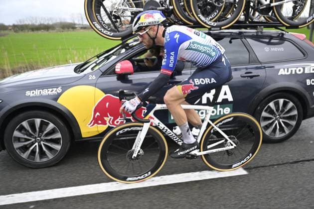 Omloop Het Nieuwsblad 2026 Cycling Race NINOVE, BELGIUM - FEBRUARY 28 : Meeus Jordi (BEL) of Red Bull BORA Hansgrohe with the team car during the 81th edition of Omloop Het Nieuwsblad an UCI World Tour 1.UWT one day cycling road race for Men Elite of km with start in Ghent and finish in Ninove on February 28, 2026 in Ninove, Belgium, 28 02 2026 ( Motordriver Kenny Verfaillie - Ninove Belgium  Copyright: xNicoxVereeckenx