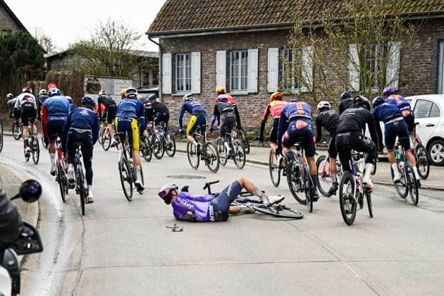 Omloop Het Nieuwsblad 2026 Cycling Race NINOVE, BELGIUM - FEBRUARY 28 : De Pooter Dries (BEL) of Team Jayco AlUla in a crash during the 81th edition of Omloop Het Nieuwsblad an UCI World Tour 1.UWT one day cycling road race for Men Elite of km with start in Ghent and finish in Ninove on February 28, 2026 in Ninove, Belgium, 28 02 2026 ( Motordriver Kenny Verfaillie - Ninove Belgium  Copyright: xNicoxVereeckenx