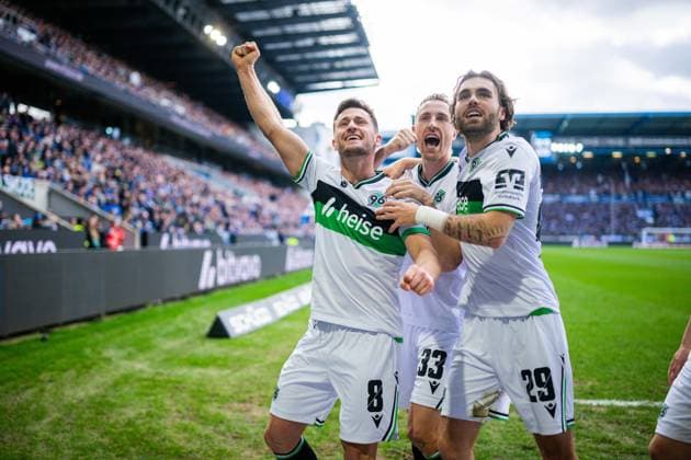 28 02 2026 Soccer, 2025 2026, 2 Bundesliga, 24 Matchday, DSC Arminia Bielefeld Hannover 96 L R Enzo Leopold Hannover celebrates after his goal to 0 1 with Maurice Neubauer Hannover , Kolja Oudenne Hannover DFL REGULATIONS PROHIBIT ANY USE OF PHOTOGRAPHS AS IMAGE SEQUENCES AND OR QUASI VIDEO