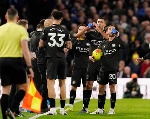 Leeds, England, 28th February 2026. Manchester City players take on fluids during a pre arranged break for the players that are fasting during the holy event of Ramadan during the Leeds United vs Manchester City Premier League match at Elland Road, Leeds. Picture credit should read: Andrew Yates Sportimage EDITORIAL USE ONLY. No use with unauthorised audio, video, data, fixture lists, club league logos or live services. Online in-match use limited to 120 images, no video emulation. No use in betting, games or single club league player publications. SPI_040_AY_Leeds_Man_City SPI-4565-0040