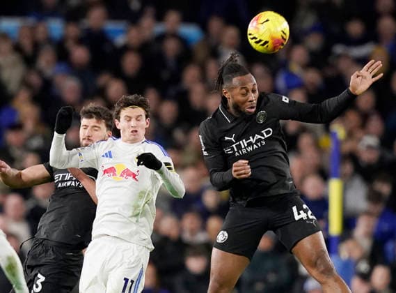Leeds, England, 28th February 2026. Antoine Semenyo of Manchester City (r) tussles with Brenden Aaronson of Leeds United (l) during the Leeds United vs Manchester City Premier League match at Elland Road, Leeds. Picture credit should read: Andrew Yates Sportimage EDITORIAL USE ONLY. No use with unauthorised audio, video, data, fixture lists, club league logos or live services. Online in-match use limited to 120 images, no video emulation. No use in betting, games or single club league player publications. SPI_063_AY_Leeds_Man_City SPI-4565-0063