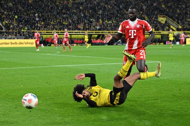 Sport Bilder des Tages Karim Adeyemi (Borussia Dortmund) und Dayot Upamecano (FC Bayern Muenchen) im Zweikampf waehrend des Spiels der Bundesliga zwischen Borussia Dortmund und FC Bayern München, Signal Iduna Park am 28. February 2026 in Dortmund, Deutschland. (Foto von Ralf Treese DeFodi Images) +++ Karim Adeyemi (Borussia Dortmund) und Dayot Upamecano (FC Bayern Muenchen) battle for the ball during the Bundesliga match between Borussia Dortmund and FC Bayern München at Signal Iduna Park on February 28, 2026 in Dortmund, Germany. (Photo by Ralf Treese DeFodi Images) DFL regulations prohibit any use of photographs as image sequences and or quasi-video. (Photo by Ralf Treese DeFodi Images) - *** Karim Adeyemi Borussia Dortmund and Dayot Upamecano FC Bayern Muenchen battle for the ball during the Bundesliga match between Borussia Dortmund and FC Bayern Munich, Signal Iduna Park on February 28, 2026 in Dortmund, Germany Photo by Ralf Treese DeFodi Images Karim Adeyemi Borussia Dortmund and Dayot Upamecano FC Bayern Muenchen battle for the ball during the Bundesliga match between Borussia Dortmund and FC Bayern München at Signal Iduna Park on February 28, 2026 in Dortmund, Germany Photo by Ralf Treese DeFodi Images DFL regulations prohibit any use of photographs as image sequences and or quasi video Photo by Ralf Treese DeFodi Images