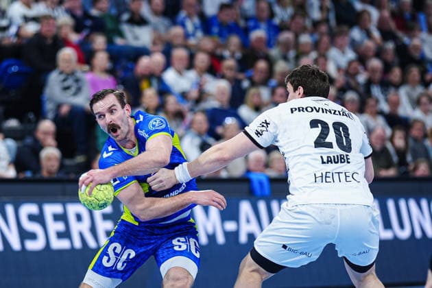 Teitur Oern Einarsson VfL Gummersbach, 14 , Lucas Laube THW Kiel, 20 GER, THW Kiel vs VfL Gummersbach, Handball, 1 Bundesliga, Matchday 23, Season 2025 2026, 28 02 2026 GER, THW Kiel vs VfL Gummersbach, Handball, 1 Bundesliga, Matchday 23, Season 2025 2026, 28 02 2026 Kiel Copyright: xEibner-Pressefoto MarcelxvonxFehrnx EP_MFN