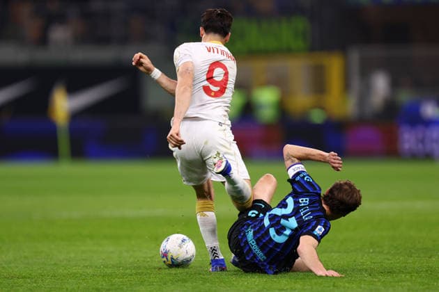 Vitinha Carvalho Olivera (Genoa Cfc) und Nicolo Barella (Fc Internazionale) battle for the ball, Serie A, FC Internazionale v Genoa CFC, Giuseppe Meazza, February 28, 2026, Milan, Italy.