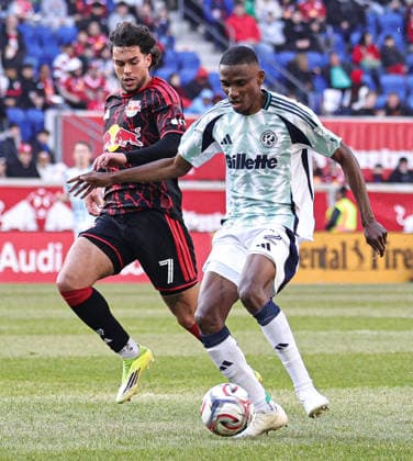 February 28, 2026, Harrison, New Jersey, USA: New England Revolution midfielder Mamadou Fofana (2) and New York Red Bulls forward Cade Cowell (7) battle for the ball at Sports Illustrated Stadium. Harrison USA - ZUMAs325 20260228_zsp_s325_017 Copyright: xJessxStilesx