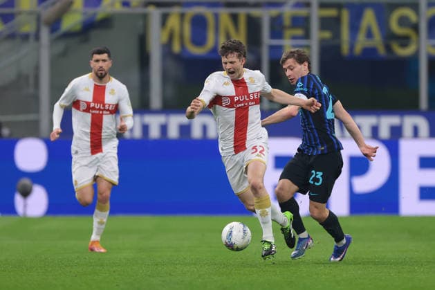 Milan, Italy, 28th February 2026. Aaron Martin of Genoa CFC looks on as team mate Morten Frendrup is fouled by Nicolo Barella of FC Internazionale during the Internazionale vs Genoa Serie A match at Giuseppe Meazza, Milan. Picture credit should read: Jonathan Moscrop Sportimage EDITORIAL USE ONLY. No use with unauthorised audio, video, data, fixture lists, club league logos or live services. Online in-match use limited to 120 images, no video emulation. No use in betting, games or single club league player publications. SPI_064_INTER_GENOA_ SPI-4553-0064