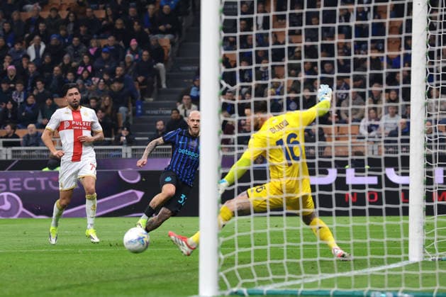 Milan, Italy, 28th February 2026. Federico Dimarco of FC Internazionale scores to give the hosts a 1-0 lead during the Internazionale vs Genoa Serie A match at Giuseppe Meazza, Milan. Picture credit should read: Jonathan Moscrop Sportimage EDITORIAL USE ONLY. No use with unauthorised audio, video, data, fixture lists, club league logos or live services. Online in-match use limited to 120 images, no video emulation. No use in betting, games or single club league player publications. SPI_061_INTER_GENOA_ SPI-4553-0061