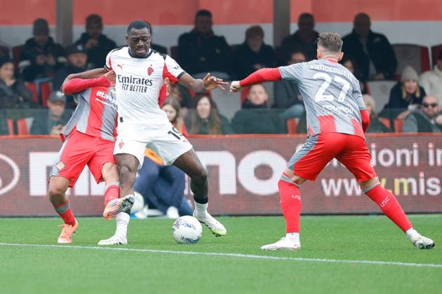 Youssouf Fofana of AC Milan under pressure from Youssef Maleh of US Cremonese during the match of 6th day of the Serie A Championship between US Cremonese vs AC Milan at the Giovanni Zini Stadium on 1 March 2026 in Cremona, CR.  Copyright: xEmanuelexPennacchio IPAxSportx xipa-agency.netx xx IPA_72212140 IPA_Agency_IPA72212140