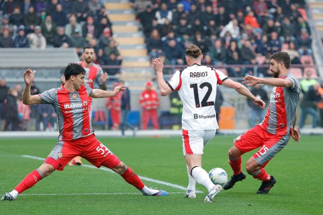 Adrien Rabiot of AC Milan under pressure from Francesco Folino of US Cremonese and Matteo Bianchetti of US Cremonese during the match of 6th day of the Serie A Championship between US Cremonese vs AC Milan at the Giovanni Zini Stadium on 1 March 2026 in Cremona, CR.  Copyright: xEmanuelexPennacchio IPAxSportx xipa-agency.netx xx IPA_72210682 IPA_Agency_IPA72210682