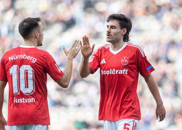 Soccer, Men, Season 2025 2026, 2 Bundesliga 24 Matchday , Hertha BSC 1 FC Nuremberg, f l Julian Justvan Nuremberg , Tom Baack Nuremberg , Cheering after goal to 1 1, 01 03 2026, Copyright: xSebastianxRäppold MatthiasxKochx