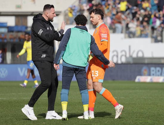 Consolation for goalkeeper Elhan Kastrati Eintracht Braunschweig Football, Men, Season 2025 2026 2 BL, Eintracht Stadion, Eintracht Braunschweig vs SC Preussen Muenster DFL REGULATIONS PROHIBIT ANY USE OF PHOTOGRAPHS AS IMAGE SEQUENCES AND OR QUASI VIDEO