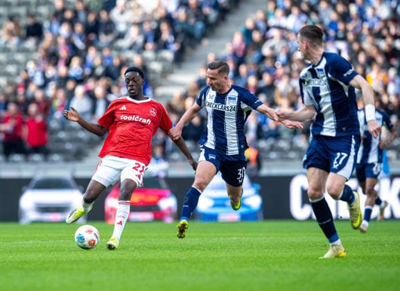 Soccer, Men, Season 2025 2026, 2 Bundesliga 24 Matchday , Hertha BSC 1 FC Nürnberg, v l Rabby Nzingoula Nürnberg , Paul Seguin Hertha BSC , Niklas Kolbe Hertha BSC , 01 03 2026, Copyright: xSebastianxRäppold MatthiasxKochx
