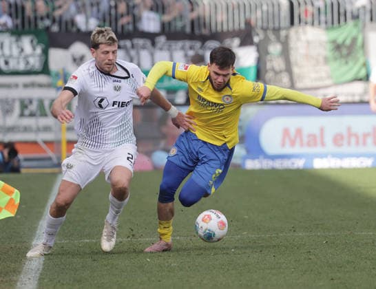 Duel between Imad Rondic SC Preussen Muenster and Mehmet Aydin Eintracht Braunschweig Football, Men, Season 2025 2026 2 BL, Eintracht Stadion, Eintracht Braunschweig vs SC Preussen Muenster DFL REGULATIONS PROHIBIT ANY USE OF PHOTOGRAPHS AS IMAGE SEQUENCES AND OR QUASI VIDEO