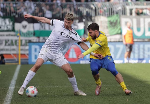 Duel between Imad Rondic SC Preussen Muenster and Mehmet Aydin Eintracht Braunschweig Football, Men, Season 2025 2026 2 BL, Eintracht Stadion, Eintracht Braunschweig vs SC Preussen Muenster DFL REGULATIONS PROHIBIT ANY USE OF PHOTOGRAPHS AS IMAGE SEQUENCES AND OR QUASI VIDEO