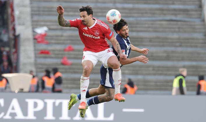 Adriano Grimaldi, Kevin Sessa duel Match scene Action Sport Football Soccer DFL 2 Bundesliga Men 24 Matchday Season 2025 2026 01 03 2026 Hertha BSC Berlin vs 1 FC Nürnberg FCN DFL regulations prohibit any use of photographs as image sequences and or quasi video