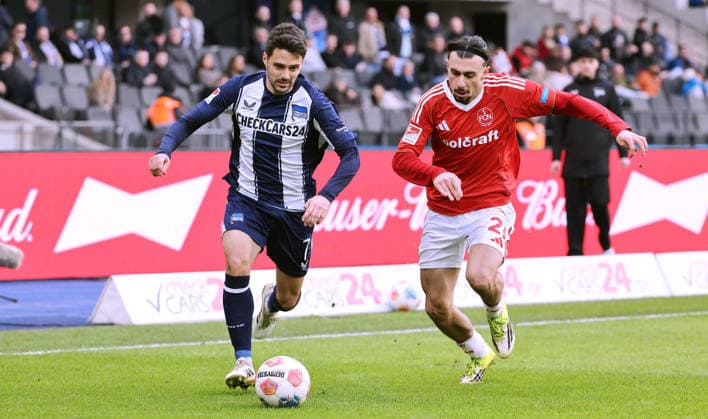 Josip Brekalo, Berkay Yilmaz duel Match scene Action Sport Football Soccer DFL 2 Bundesliga Men 24 Matchday Season 2025 2026 01 03 2026 Hertha BSC Berlin vs 1 FC Nürnberg FCN DFL regulations prohibit any use of photographs as image sequences and or quasi video