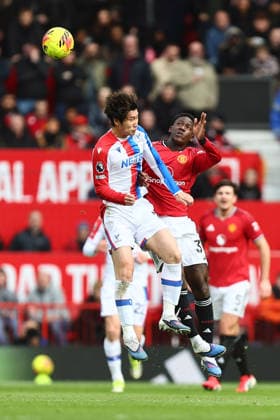 Daichi Kamada of Crystal Palace and Kobbie Mainoo of Manchester United, ManU Manchester United v Crystal Palace, Premier League, Football, Old Trafford, Manchester, UK - 01 Mar 2026Manchester Old Trafford United Kingdom EDITORIAL USE ONLY No use with unauthorised audio, video, data, fixture lists, club league logos or live services. Online in-match use limited to 120 images, no video emulation. No use in betting, games or single club league player publications. Copyright: xPhilxOldham Shutterstockx 16708837u