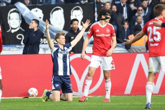 DEU, DFL, 2 FBL, Hertha BSC vs 1 FC Nuernberg, 01 03 2026, Berliner Olympiastadion, Berlin, DEU, DFL, 2 FBL, Hertha BSC vs 1 FC Nuernberg, im Bild Luca Schuler Hertha BSC Berlin 18 , Gruber, Fabio 1 FC Nuernberg 4 DFL regulations prohibit any use of Photographs as image sequences and or quasi video nordphotoxGmbHx xEngler nph00076