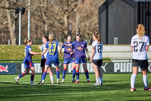 01 03 2026, GER, womens soccer, test match, 2025 2026, RB Leipzig FC Ingolstadt goal celebration, high-five, after 1 1 equalizer Leipzig training center of the Red Bull Saxony Germany