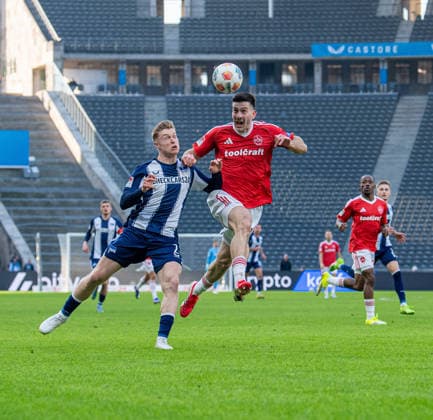 Soccer, Men, Season 2025 2026, 2 Bundesliga 24 Matchday , Hertha BSC 1 FC Nürnberg, v l Julian Eitschberger Hertha BSC , Luka Lochoshvili Nürnberg , 01 03 2026, Copyright: xSebastianxRäppold MatthiasxKochx