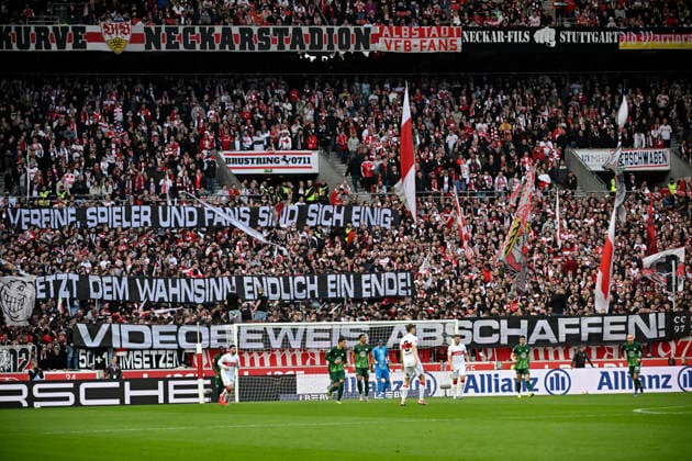 Banner, protest, protest poster, fan poster, banner, poster, banner abolish video evidence VAR, video assistant, video evidence, video referee, video assistant referee VfB Stuttgart vs VfL Wolfsburg WOB 01 03 2026 DFL REGULATIONS PROHIBIT ANY USE OF PHOTOGRAPHS AS IMAGE SEQUENCES AND OR QUASI VIDEO VfB Stuttgart vs VfL Wolfsburg WOB
