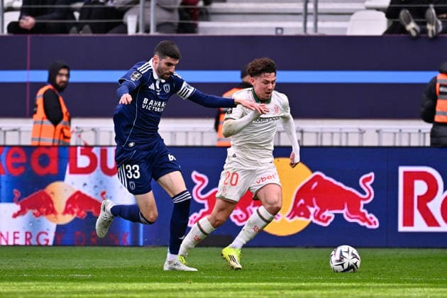 FOOTBALL : Paris FC vs Nice - Ligue 1 - 01 03 2026 Pierre Lees Melou ( 33 - PFC ) and Tom Louchet ( 20 - Nice ) during the Ligue 1 match between Paris FC and OGC Nice at Stade Jean Bouin on March 01, 2026 in Paris, France. ( Photo by Federico Pestellini PsnewZ ) - ParisFrance  Copyright: xFedericoxPestelinix